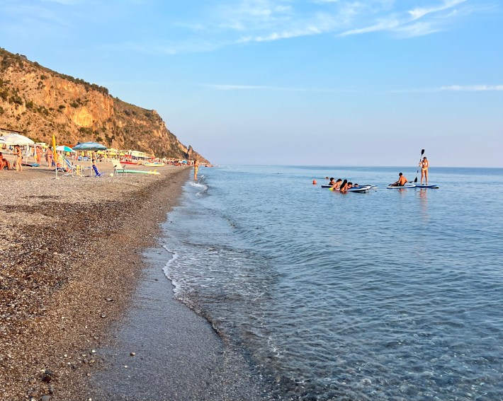 Rocky coastline and clear blue water in the Cilento area of Campania