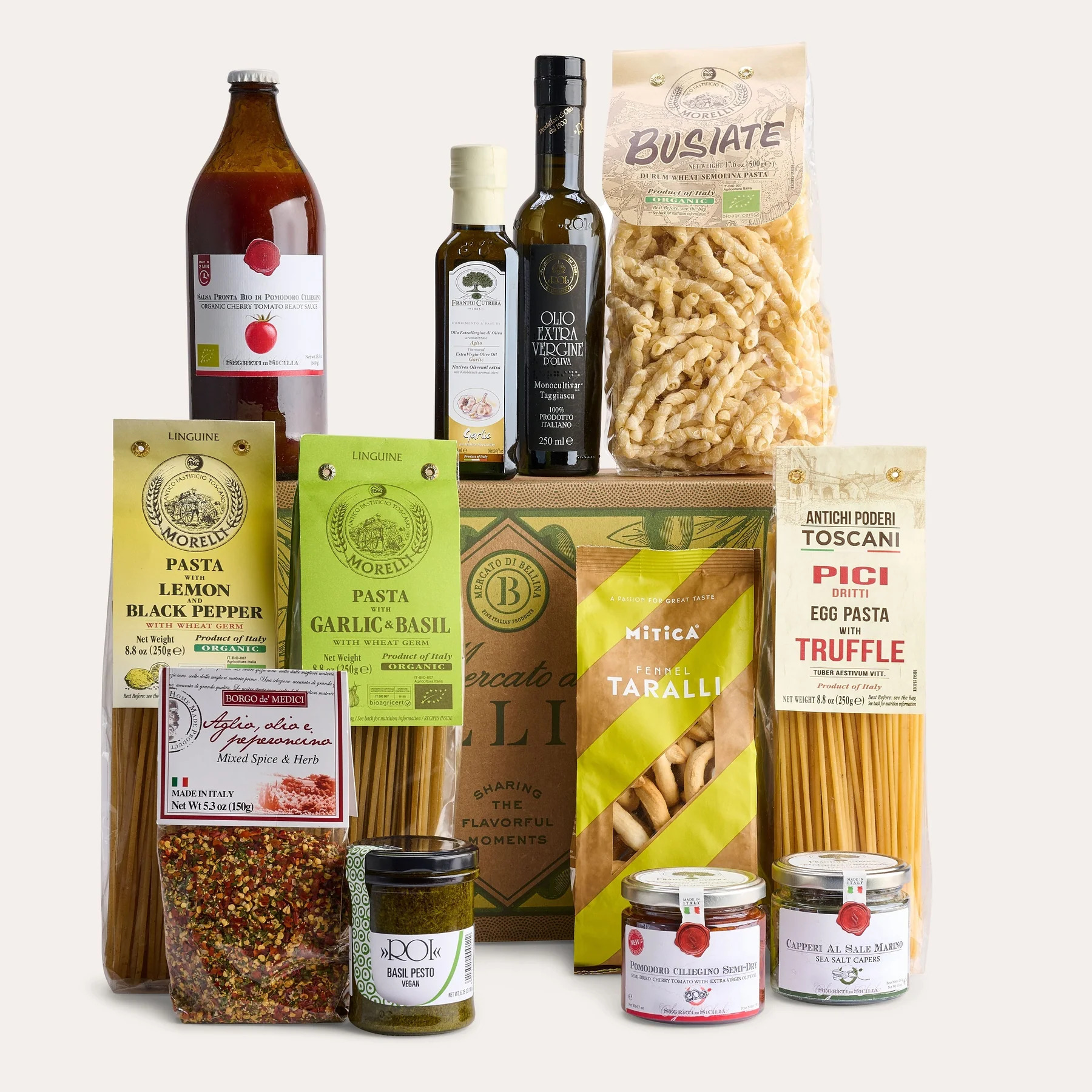 Mercato di Bellina Italian gift basket with pasta, olive oil, pesto, taralli, tomatoes and specialty pantry items.