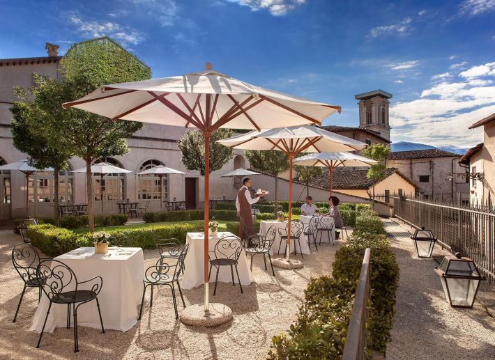 Garden terrace at Vespasia restaurant in Norcia, Umbria.