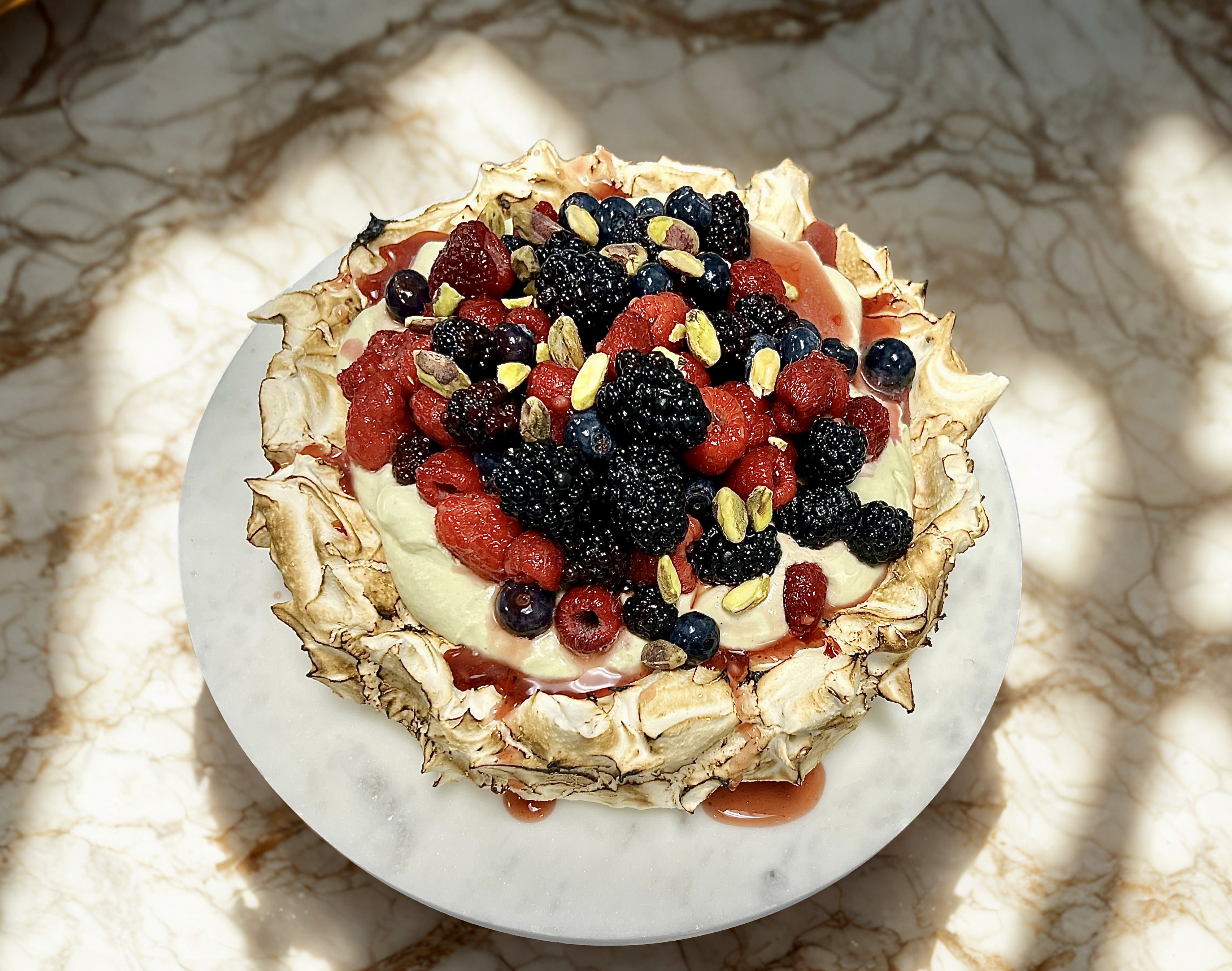 How to Make Pavlova with Pistachio Chantilly and Frutti di Bosco - Appetito
