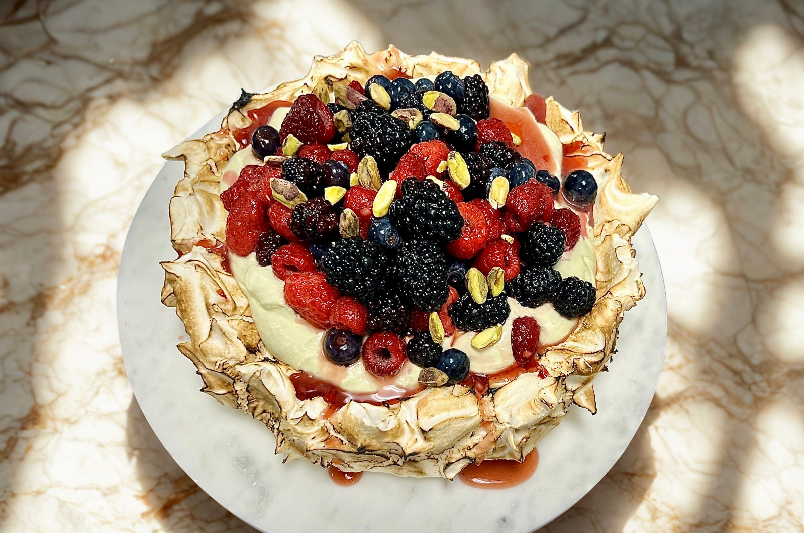 Pavlova with Pistachio Chantilly and Frutti di Boscou