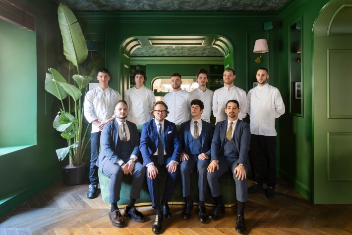 Team photo of the staff at Luca's restaurant in Florence.