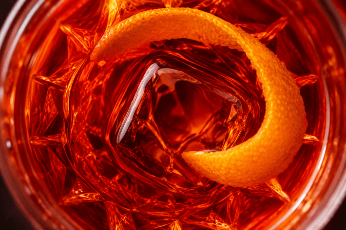A close-up of the Mirto Negroni,