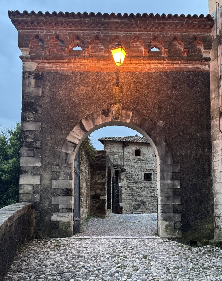 Stone archway entrance to the Castle of Caterina Cornaro in Asolo Italy
