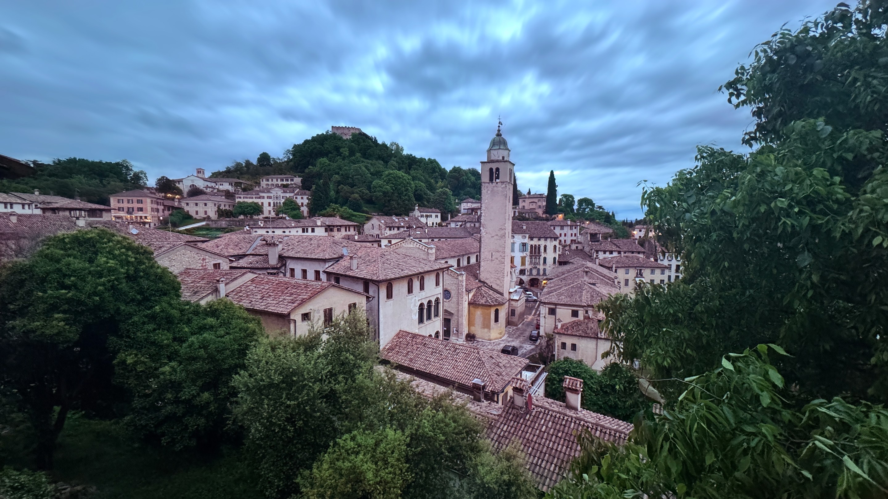 Historic rooftops and bell tower in the hill town of Asolo Italy