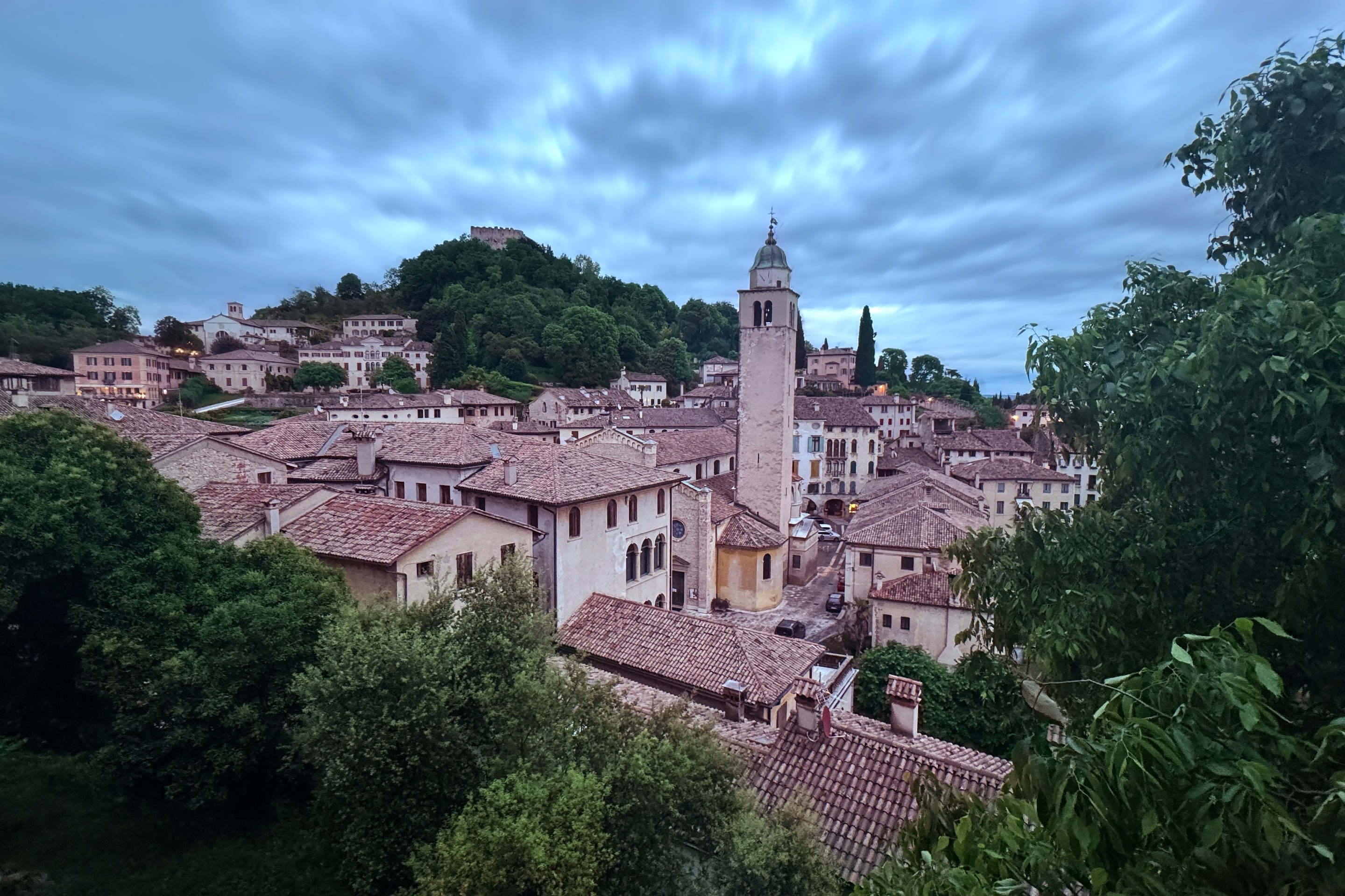 Historic rooftops and bell tower in the hill town of Asolo Italy