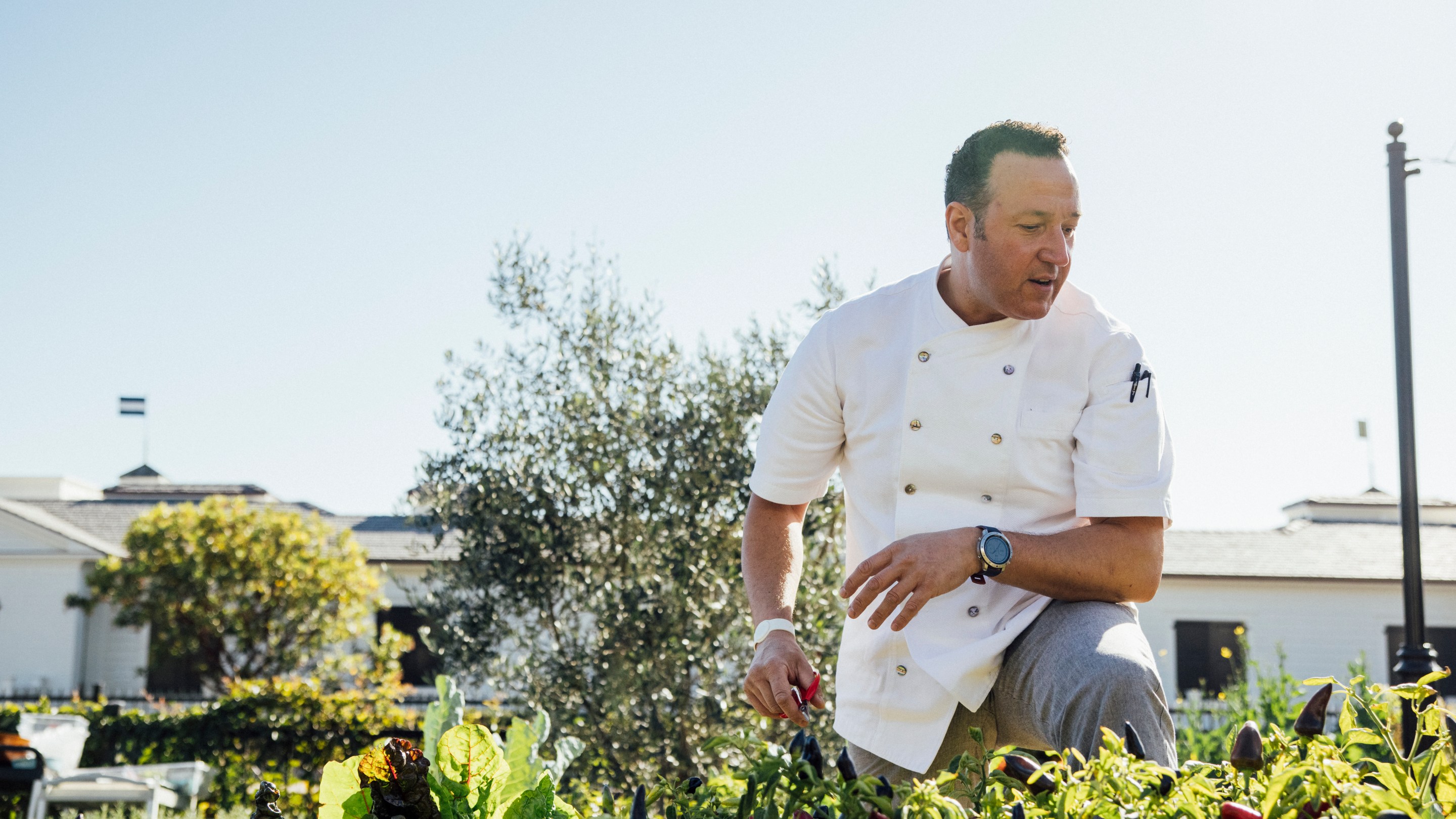 Chef Massimo Falsini in the garden at Rosewood Miramar Beach.