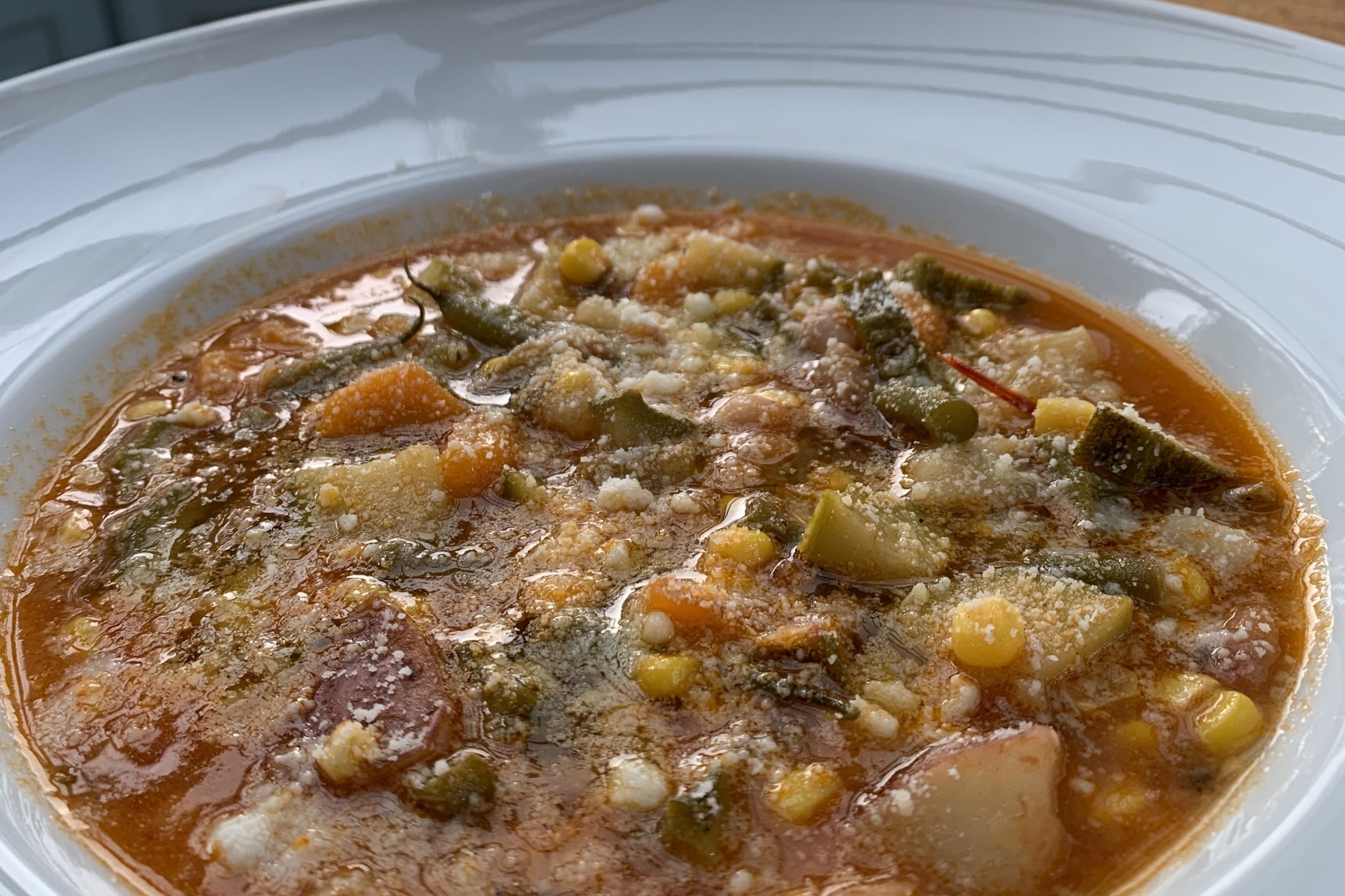 Nonna’s Italian summer vegetable soup with zucchini, corn, green beans, potatoes and cannellini beans.