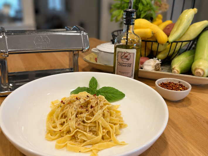 Homemade fettuccine served with olive oil, red pepper flakes and grated cheese.