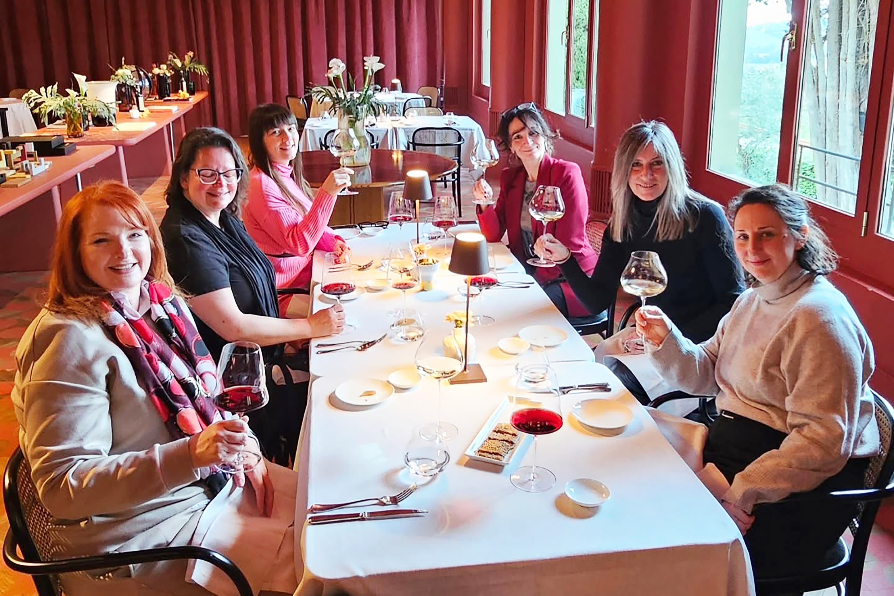 Lunch with friends around a table at Ruffino Winery