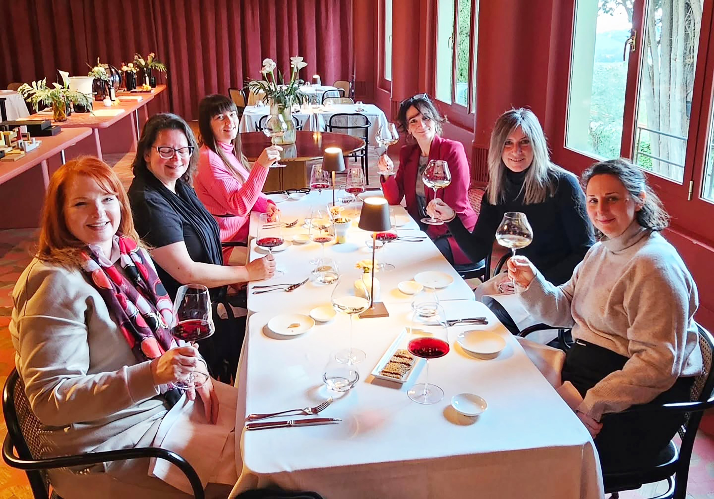 Lunch with friends around a table at Ruffino Winery