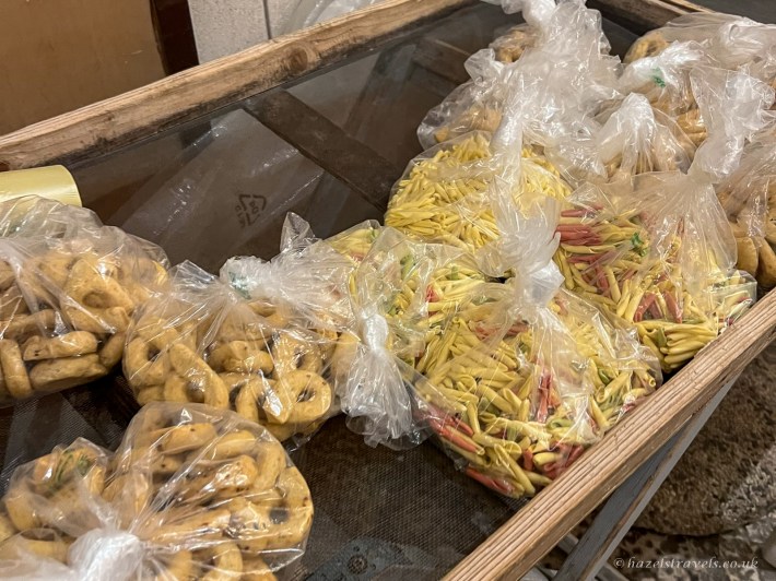 Homemade pasta and taralli left outside in Arco Basso, Bari Vecchia, after the day's orecchiette had sold out. Photo © Hazel’s Travels.