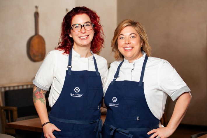 Chefs Bailey Sullivan and Sarah Grueneberg wearing Monteverde aprons.
