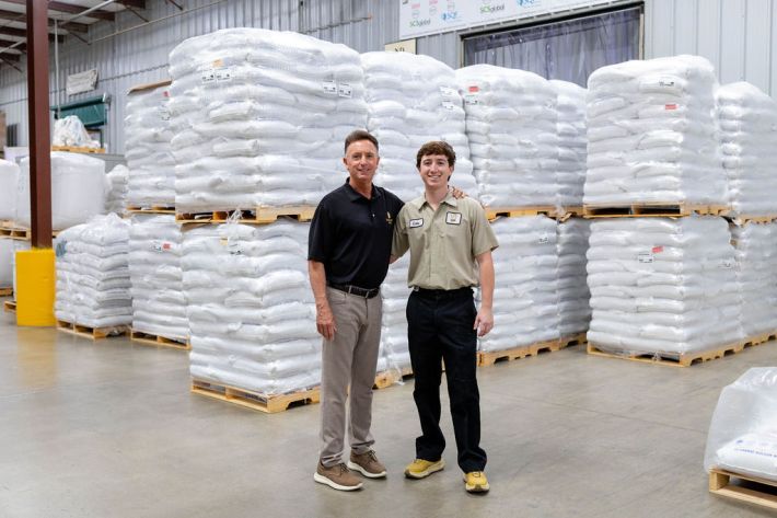 Steve Orlando and his son, Luke, inside the Sunnyland Mills warehouse.