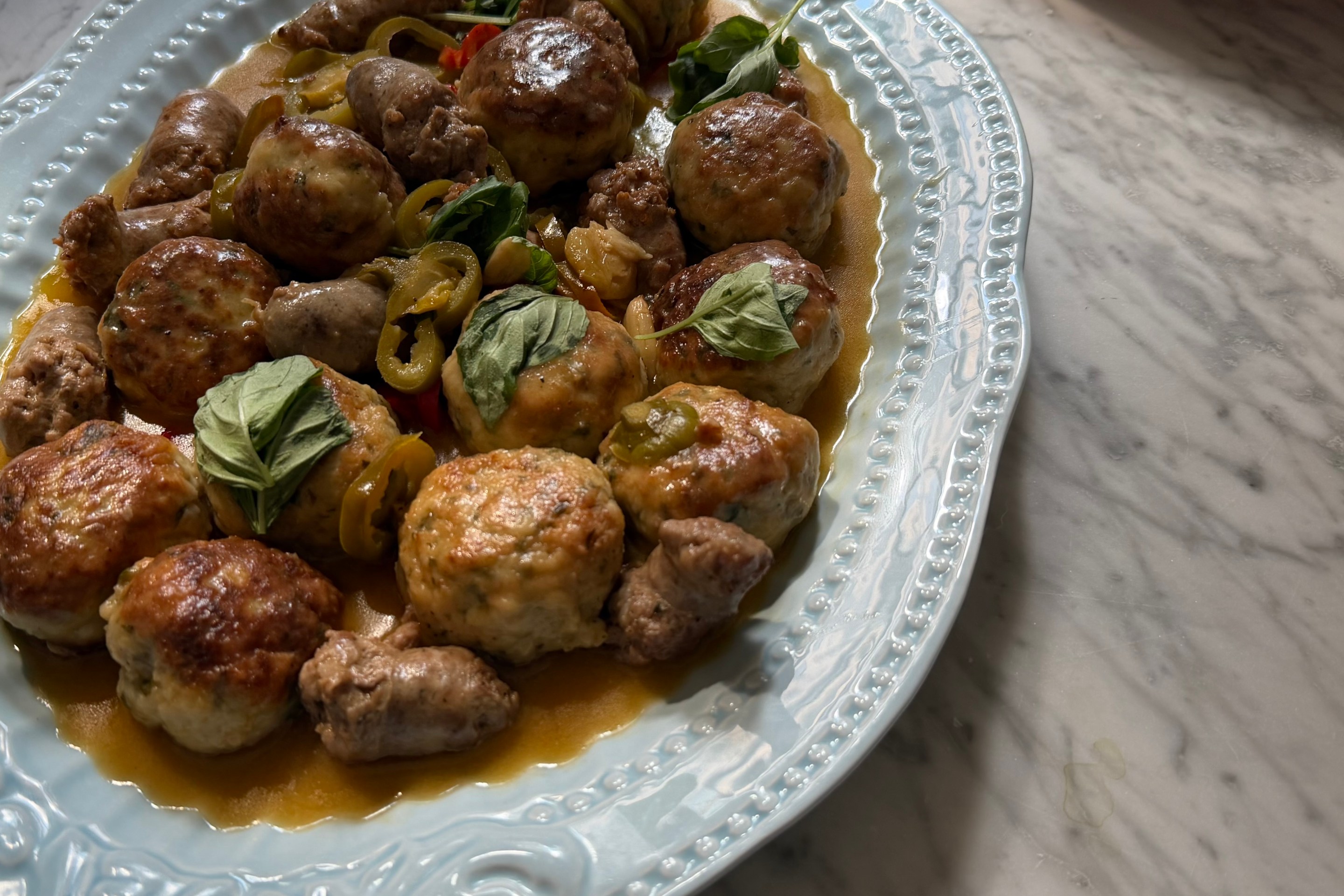 Chicken Meatball Scarpariello with Italian sausage, cherry peppers and fresh basil.