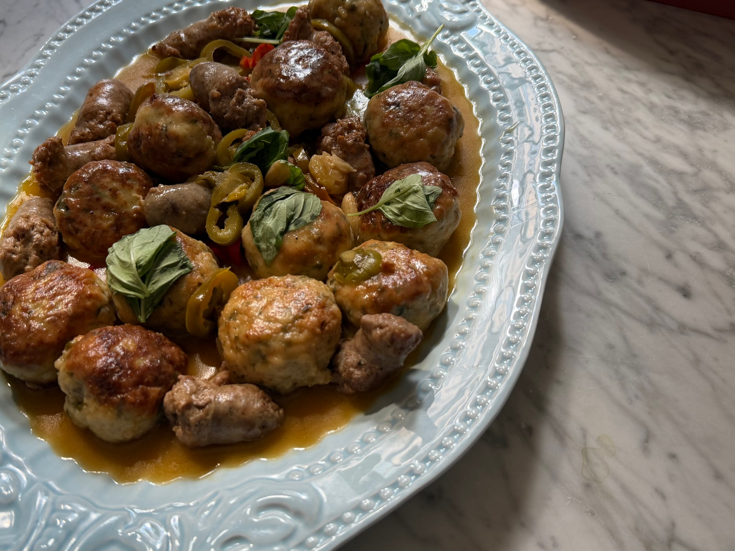 Chicken Meatball Scarpariello with Italian sausage, cherry peppers and fresh basil.