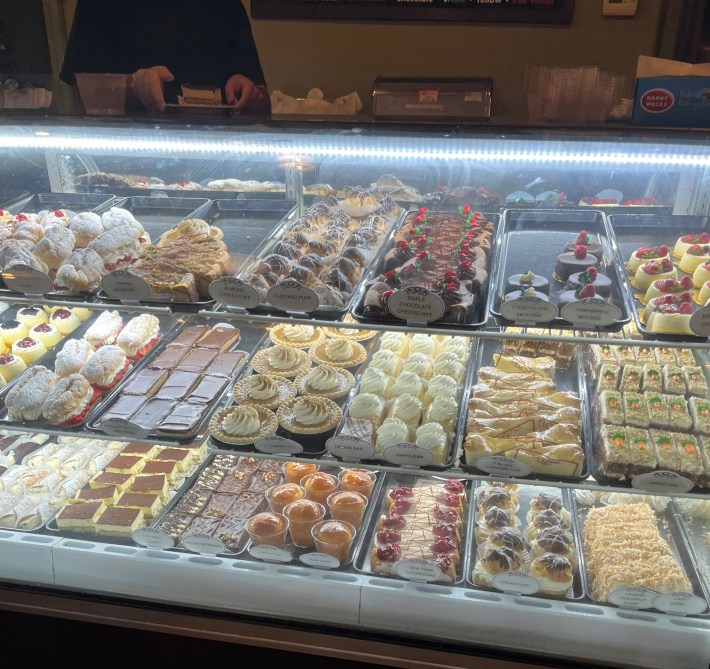 A case inside Presti’s Bakery & Café filled with an assortment of cookies. Photo by Nikki Gasiewski.