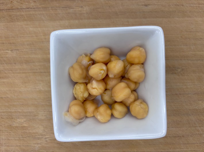 Canned chickpeas in a white bowl