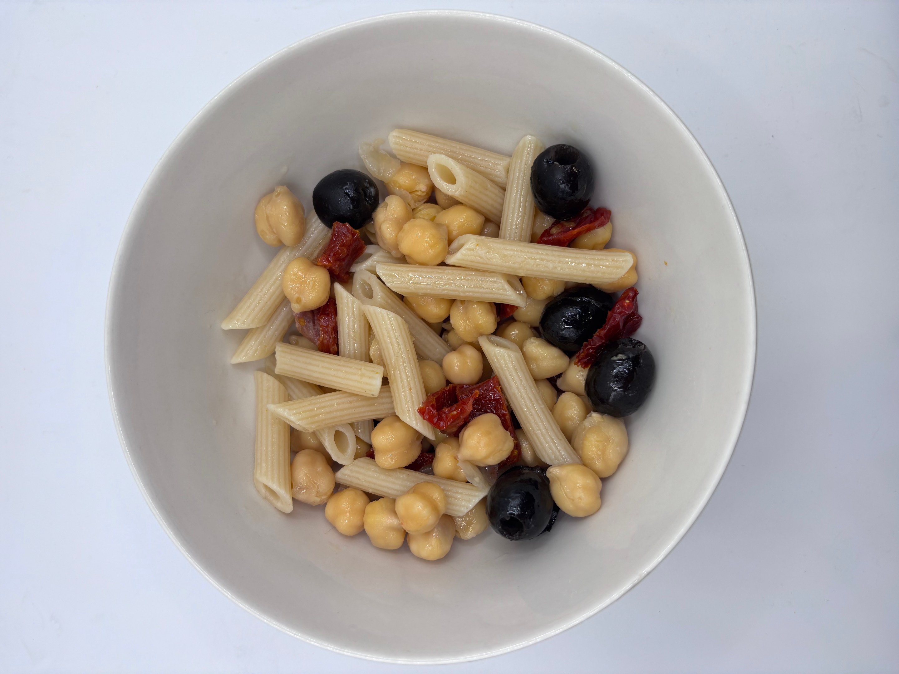 Penne with chickpeas, black olives and sun-dried tomatoes