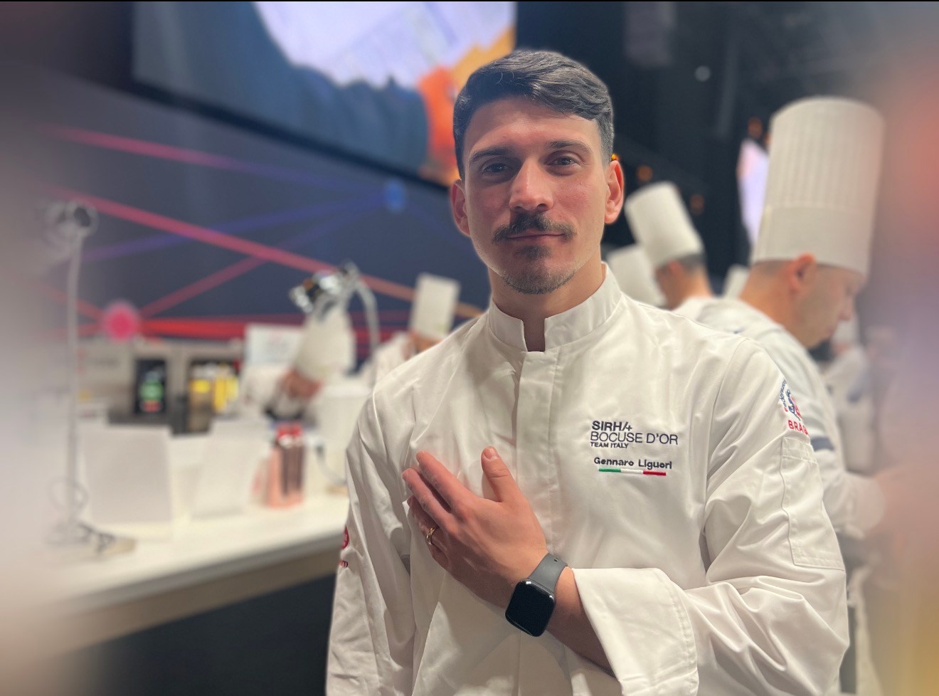 Chef Gennaro Liguori wearing a white Bocuse d’Or Team Italy jacket.