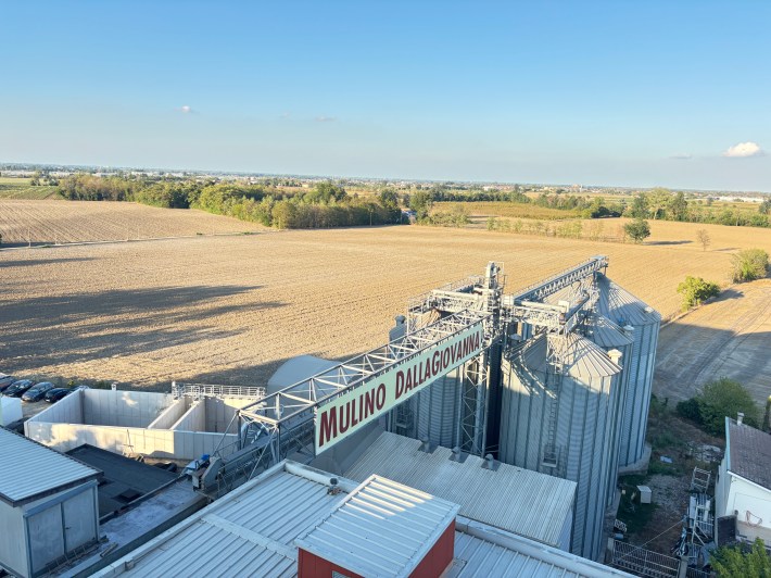 Molino Dallagiovanna mill beside harvested fields