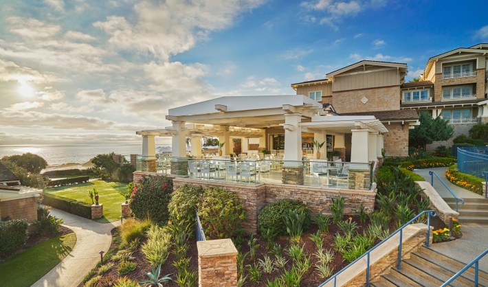 The outdoor dining area of the Mosaic Bar and Grill at the Montage Laguna Beach.